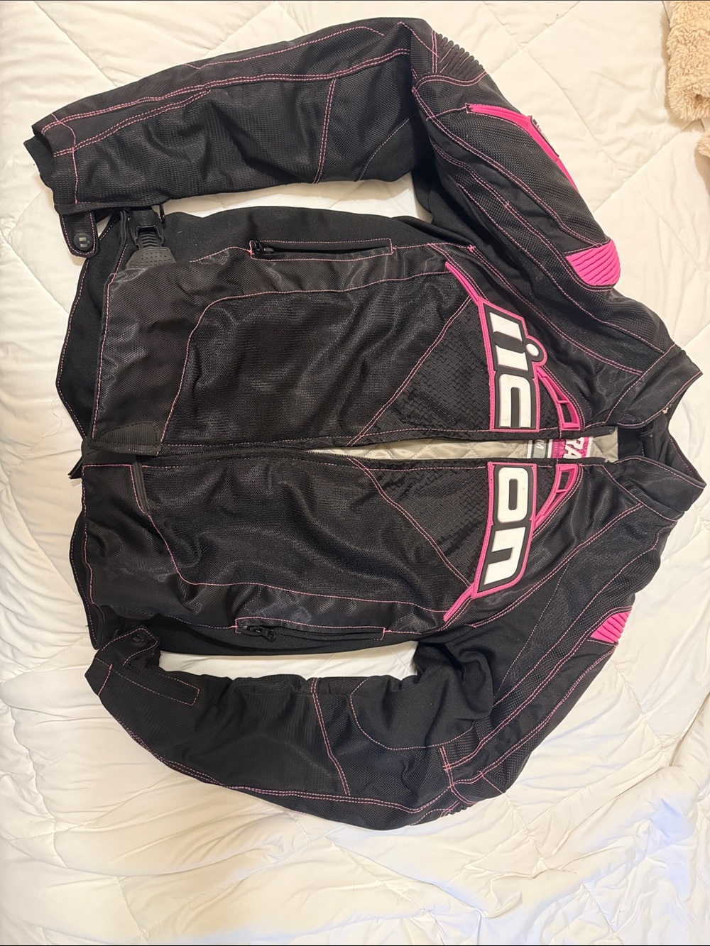 ICON Women's Black Motorcycle Jacket with Pink Accents